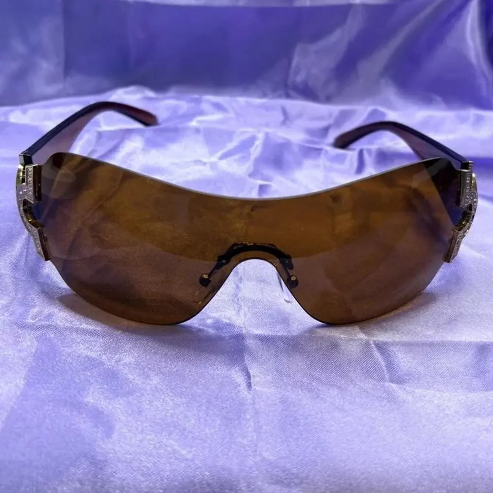 Brown shield sunglasses featuring oversized rimless lenses rhinestone luxe y2k